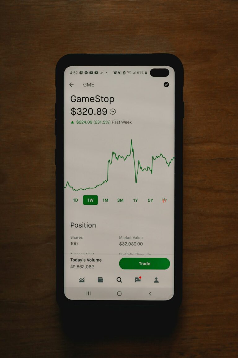GameStop stock price displayed on a smartphone screen showing a value of $320.89 and a significant weekly increase of 231.5%