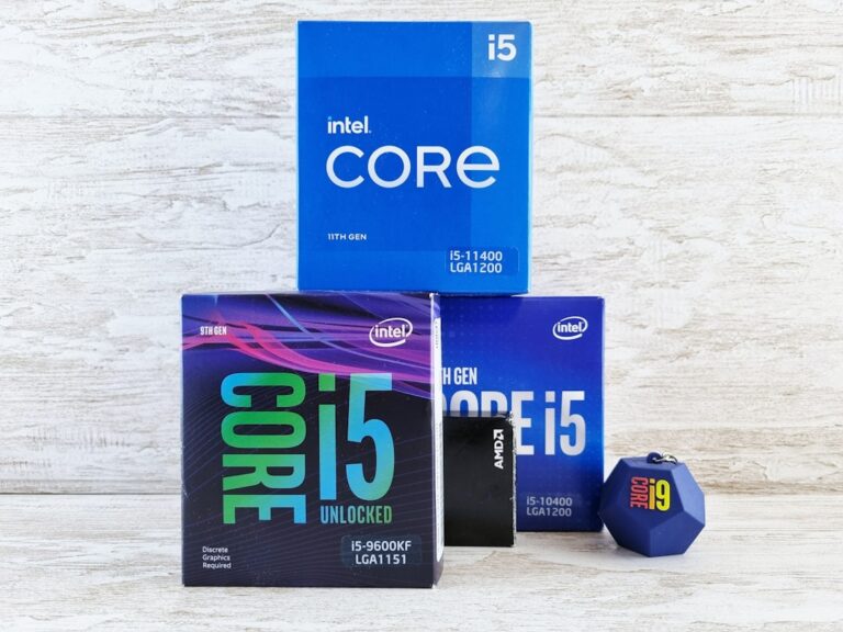 Boxes of Intel Core processors from the 9th and 11th generations showcased on a wooden surface