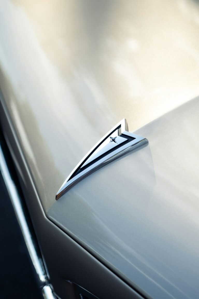 Close-up of Rivian vehicle hood showing emblem