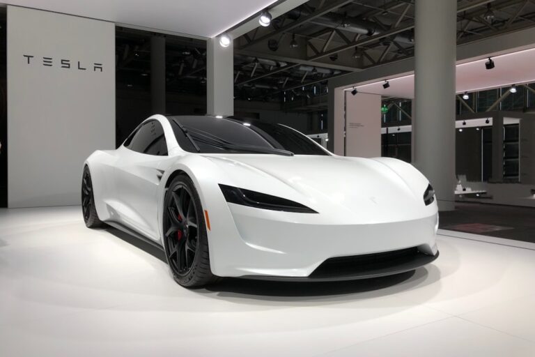 Telsa Electric Car Displayed in a Modern Showroom