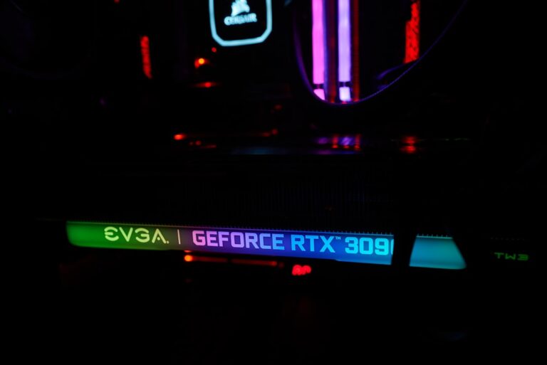 Close-up of EVGA GeForce RTX 3090 graphics card with illuminated colorful branding